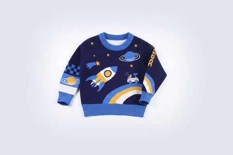 Children's sweater with space-themed design on a white background