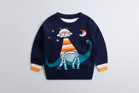 Navy blue sweater with dinosaur and alien design on a white background