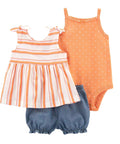 Set of children's clothing including a striped top, polka dot tank top, and denim shorts on a white background.