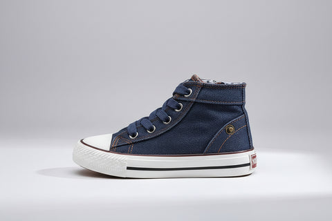 Blue denim high-top sneaker with a gold zipper on a white background