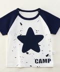 Children's t-shirt with a star design and 'CAMP' text on a hanger against a white background