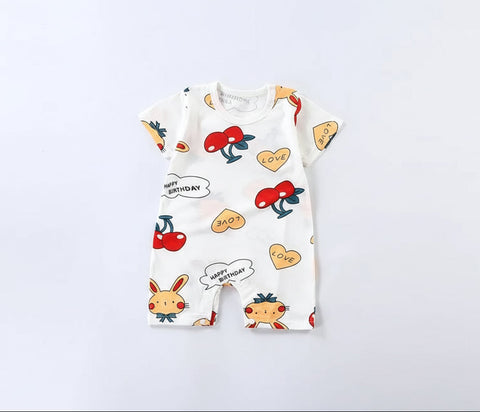 Baby romper with colorful animal prints on a light gray background