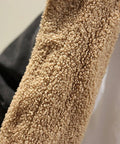 Close-up of a textured beige sleeve with a blurred background