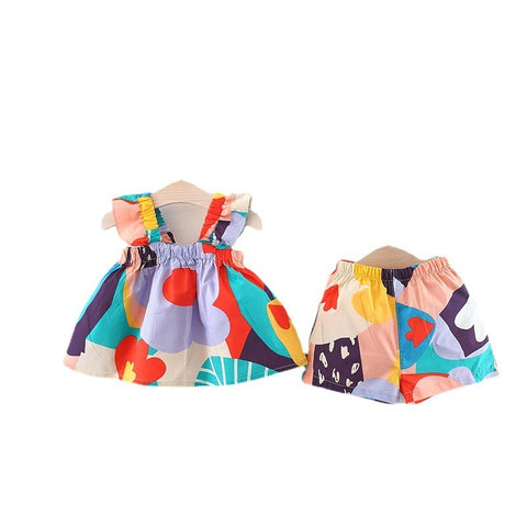 Fröhliches und farbenfrohes Set aus Baumwollbluse und Shorts