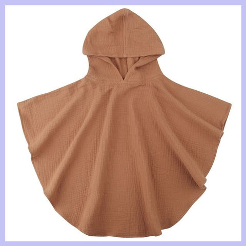 Brown hooded poncho on a white background