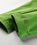 Green pants with a white background