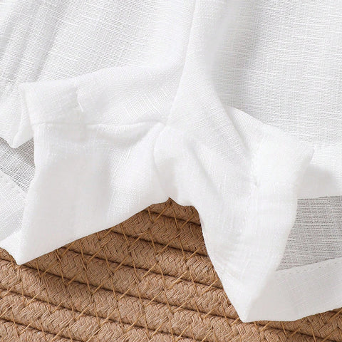 Komplet polo majice, brezrokavnika in kratkih hlač z vezenjem