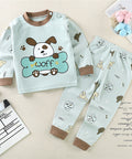 Children's pajama set with cartoon dog design on a light background