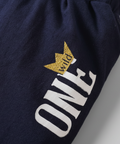 Navy blue sweatshirt with 'ONE' logo featuring a gold crown on a white background