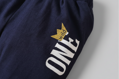 Navy blue sweatshirt with 'ONE' logo featuring a gold crown on a white background