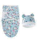 Baby swaddle and hat set with bunny pattern on a light blue background