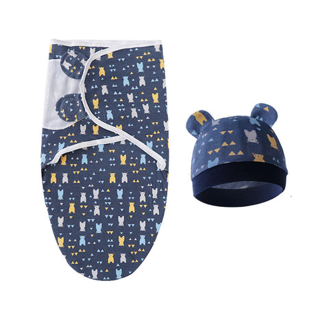 Baby swaddle and hat set with animal pattern on a white background