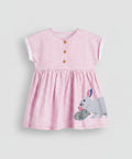 Pink dress with a rabbit design on a white background