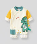 Baby onesie with dinosaur design on a light gray background