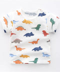 White t-shirt with colorful dinosaur pattern on a white background