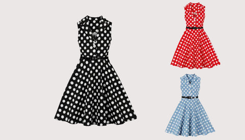 Three polka dot dresses in black, red, and blue on a light gray background