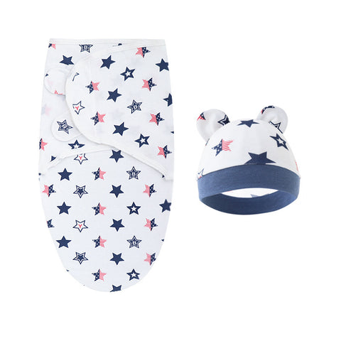 Baby swaddle and hat set with star pattern on a white background