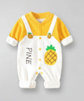 Baby onesie with pineapple design and text on a gray background