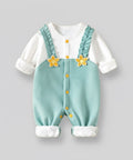 Baby outfit with green overalls and white shirt on a gray background, featuring the brand 'Xiao Qiudong'.