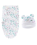 Baby swaddle and hat set with floral pattern on a white background