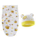 Baby swaddle with bee pattern and matching hat on a white background