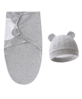 Gray baby swaddle and hat set on a white background