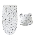 Baby swaddle and hat set with star pattern on a white background