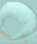 U-shaped pillow with airplane pattern on a light blue background