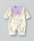 Baby romper with purple collar and white cuffs on a gray background