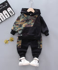 Children's hoodie and pants set with camouflage pattern on a gray background