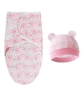 Baby swaddle and hat set with pink bear pattern on a white background