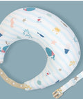 Baby toilet seat with nautical design on a light blue background