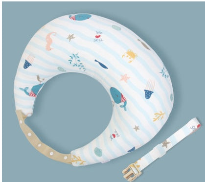 Baby toilet seat with nautical design on a light blue background
