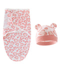 Baby swaddle and hat set with pink leopard print on a white background