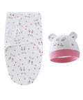 Baby swaddle and hat set with bunny pattern on a white background