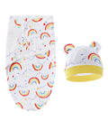 Baby swaddle with rainbow pattern and matching hat on a white background