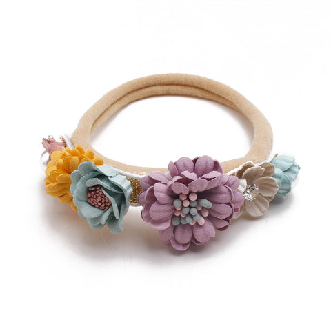 Floral hairband with colorful flowers on a white background