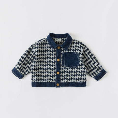 Children's houndstooth jacket with button details on a light gray background
