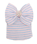 Pink and blue striped bow with a decorative center on a white background