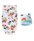 Baby swaddle with colorful animal pattern and matching hat on a white background
