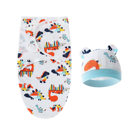 Baby swaddle with colorful animal pattern and matching hat on a white background