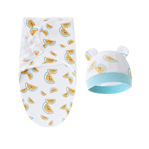Baby swaddle and hat set with watermelon pattern on a white background