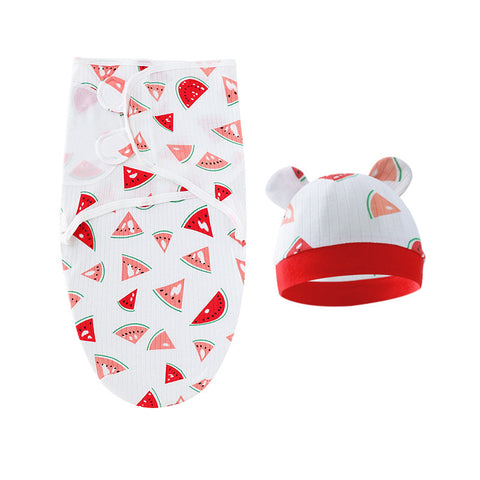 Baby swaddle and hat set with watermelon pattern on a white background