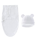White baby swaddle blanket and hat set on a white background