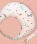 Patterned headband with cartoon designs on a pink background