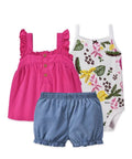 Set of children's clothing including a pink top, blue shorts, and a floral-patterned onesie on a white background.
