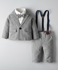 Children's gray suit with bow tie and suspenders on a light gray background