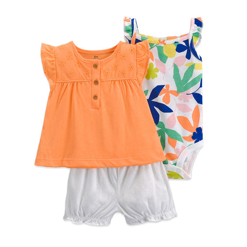 Orange top, white shorts, and floral-patterned swimsuit on a white background