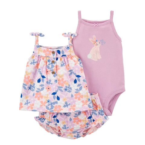 Baby girl's floral dress and pink bodysuit with bunny design on a white background