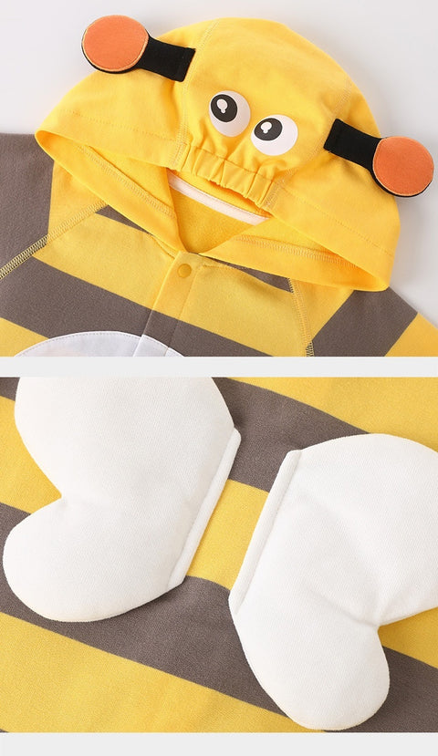 Yellow cartoon-style raincoat with a hood on a striped background